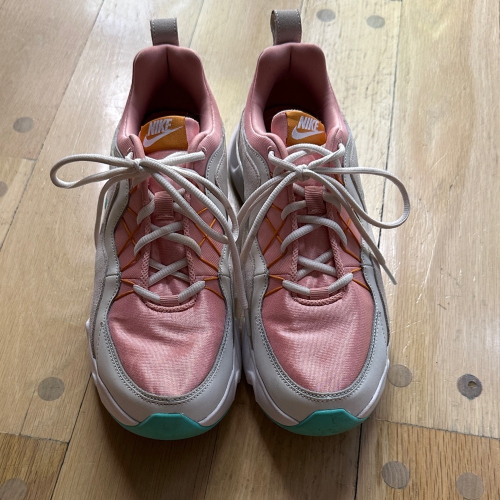Nike Women's Pink and White Sneakers with Orange Accents